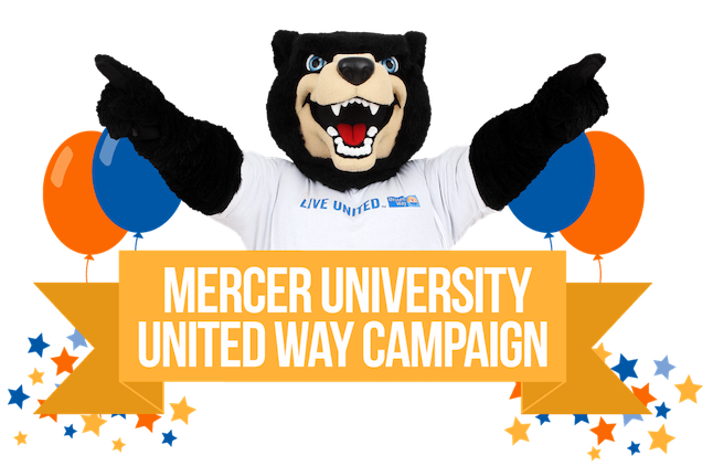 Toby surrounded by balloons and a Mercer United Way Campaign banner